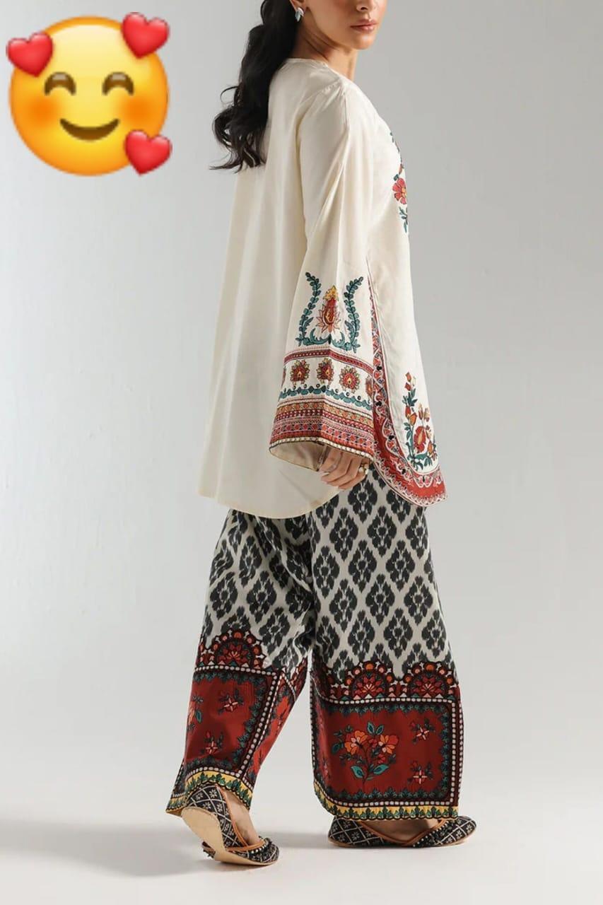 2 Pcs Women's Stitched Grip Silk Printed Shirt And Trouser